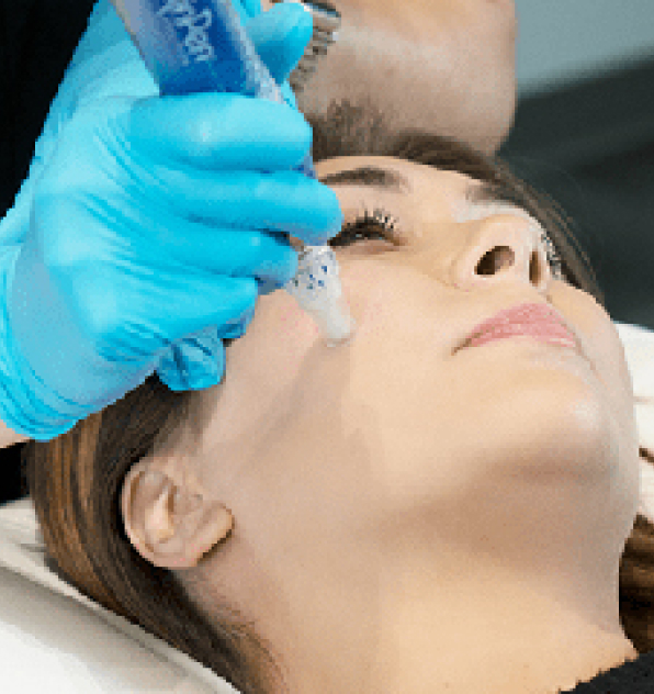 Woman undergoing an aqua facial procedure.