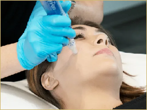 Woman undergoing an aqua facial procedure.